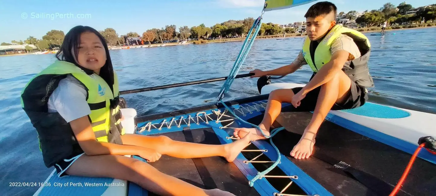 Kids sailing Swan River Perth.